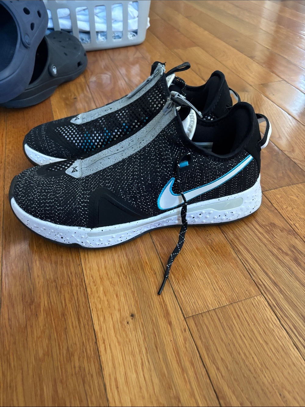 Nike Black Sneakers with Light Blue Swoosh